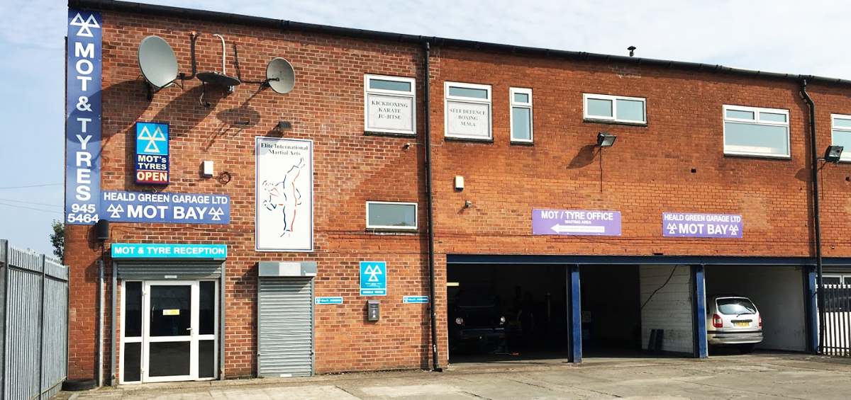 Front of our garage workshop in Heald Green in Manchester - Tyres and MOT Wythenshawe