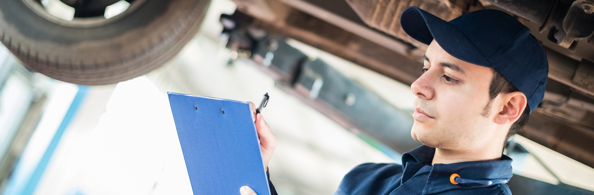 Mechanic checking over an MOT - MOT Wythenshawe - Book an MOT Online